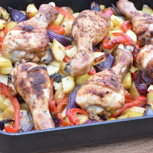 Kyllingelår i fad - med kartofler og grøntsager